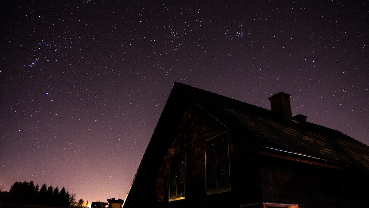 Silhouette of a house at night